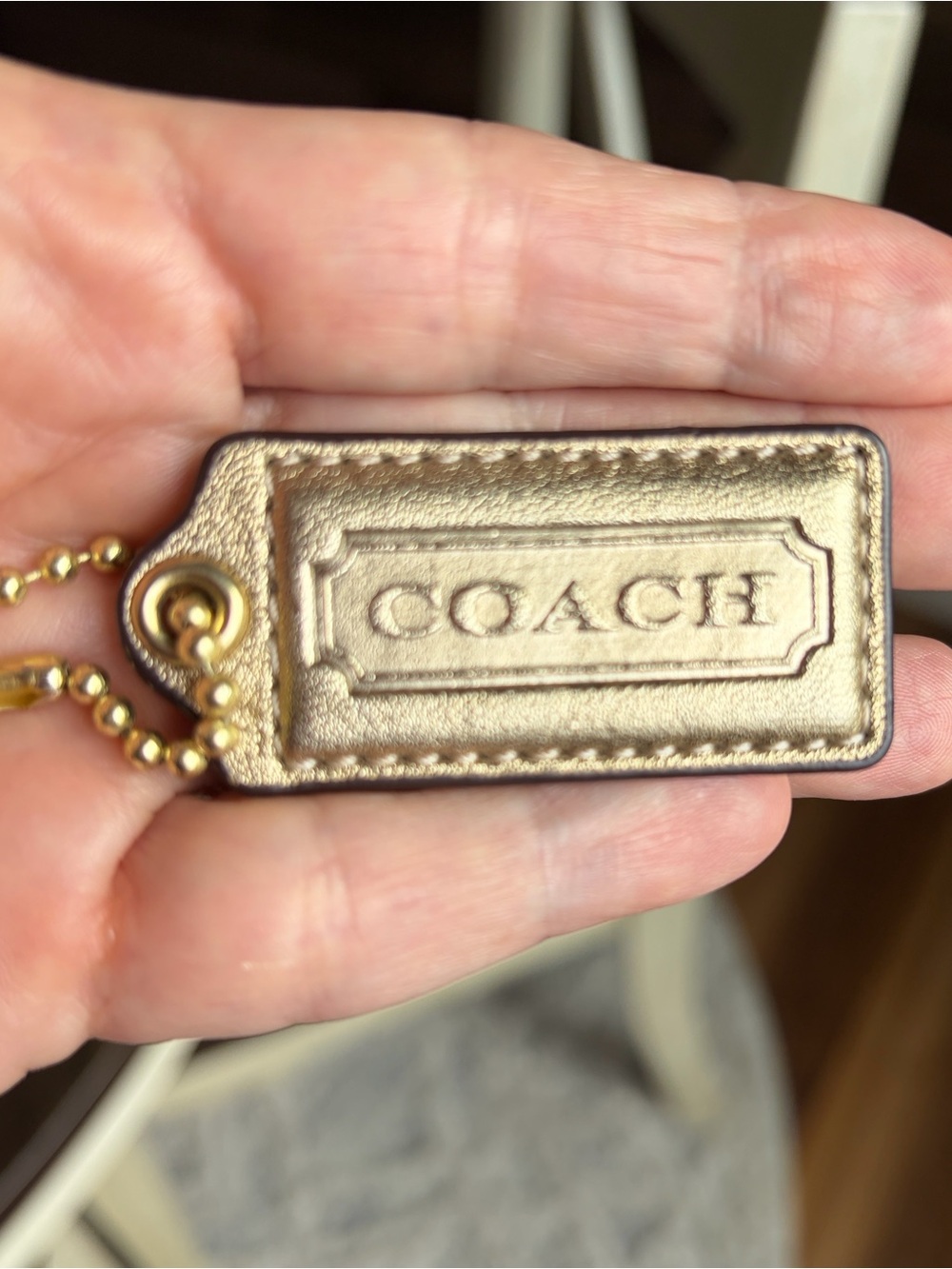 Coach Poppy Metallic Gold Leather Hangtag with gold Ball Chain
